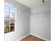 Walk-in closet with wire shelving and a window at 35 Matthew Ct, Covington, GA 30016