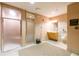 Well-lit bathroom with shower, sink, and urinal at 400 17Th Nw St # 2118, Atlanta, GA 30363