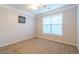 Bright bedroom with neutral walls and carpet flooring at 400 17Th Nw St # 2118, Atlanta, GA 30363