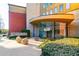 Building entrance with landscaping and seating at 400 17Th Nw St # 2118, Atlanta, GA 30363