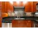 Modern kitchen with stainless steel appliances and mosaic backsplash at 400 17Th Nw St # 2118, Atlanta, GA 30363