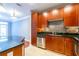 Modern kitchen with stainless steel appliances and mosaic backsplash at 400 17Th Nw St # 2118, Atlanta, GA 30363