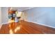 Open concept living room with hardwood floors and kitchen access at 400 17Th Nw St # 2118, Atlanta, GA 30363