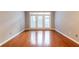 Bright living room with hardwood floors and access to a patio at 400 17Th Nw St # 2118, Atlanta, GA 30363