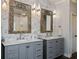 Elegant bathroom with double vanity and gray cabinets at 5060 Lloyd Ln, Cumming, GA 30040