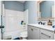Simple bathroom with a shower/tub combo and a single vanity at 5060 Lloyd Ln, Cumming, GA 30040