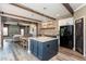 Open concept kitchen with a large island and breakfast bar at 5060 Lloyd Ln, Cumming, GA 30040