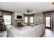 Spacious living room featuring a cozy fireplace and large windows at 5060 Lloyd Ln, Cumming, GA 30040