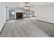 Spacious living room featuring a fireplace and large windows at 7239 Wiley Ct, Riverdale, GA 30274