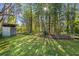 Landscaped backyard featuring bamboo and grassy area at 1116 Citadel Ne Dr, Atlanta, GA 30324