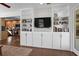 Living room with built-in entertainment center and hardwood floors at 1116 Citadel Ne Dr, Atlanta, GA 30324