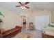 This bedroom features a ceiling fan, a sitting area, and a closet at 2191 Rockbridge Sw Rd # 202, Stone Mountain, GA 30087