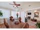 Bright dining room adjacent to living area with hardwood floors and natural light at 2191 Rockbridge Sw Rd # 202, Stone Mountain, GA 30087