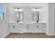 Double vanity bathroom with white cabinets and black hardware at 328 Meuse Ln, Locust Grove, GA 30248