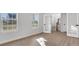Bright office with hardwood floors and view of staircase at 328 Meuse Ln, Locust Grove, GA 30248