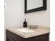 Vanity with granite countertop and rectangular sink at 1574 Mayflower St, Atlanta, GA 30311