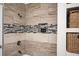 Updated bathroom with tile shower, a new vanity, and shelving at 1574 Mayflower St, Atlanta, GA 30311