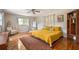 Spacious bedroom with hardwood floors and large windows at 1574 Mayflower St, Atlanta, GA 30311