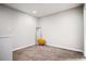 Small bedroom with grey walls and carpeted floors at 1574 Mayflower St, Atlanta, GA 30311