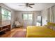 Bright bedroom with hardwood floors and a ceiling fan at 1574 Mayflower St, Atlanta, GA 30311