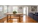 Dining room with hardwood floors, large windows and gray walls at 1574 Mayflower St, Atlanta, GA 30311