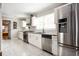 Modern kitchen with stainless steel appliances and granite countertops at 1574 Mayflower St, Atlanta, GA 30311
