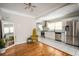 Modern kitchen with stainless steel appliances and white cabinets at 1574 Mayflower St, Atlanta, GA 30311