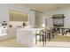 Contemporary kitchen featuring sleek white cabinetry, large island with seating, and stainless appliances at 318 Sandy Springs Cir # 260, Sandy Springs, GA 30328