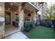 Beautiful backyard area with stone columns, fireplace, patio and well maintained lawn at 418 Townly, Alpharetta, GA 30009