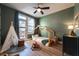 Unique bedroom with a house frame bed, teepee, and hardwood floors at 418 Townly, Alpharetta, GA 30009