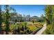Beautiful townhome community with landscaped grounds, sidewalks, and ample green space at 418 Townly, Alpharetta, GA 30009
