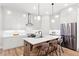 Stylish kitchen with white cabinetry, stainless steel appliances, and a central island with seating at 418 Townly, Alpharetta, GA 30009