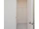 Walk-in closet with wire shelving and neutral carpeting at 1621 Aiden Way # 57, Conyers, GA 30013