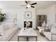 Inviting living room featuring a modern fireplace, comfortable seating, and stylish decor at 1621 Aiden Way # 57, Conyers, GA 30013