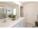 Bright bathroom with double vanity and plenty of counter space at 1621 Aiden Way # 57, Conyers, GA 30013