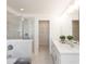 Double vanity bathroom with a large walk-in shower and separate tub at 1621 Aiden Way # 57, Conyers, GA 30013