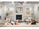 Living room with fireplace, built-ins, and hardwood floors at 2385 Chelsea Landing Way, Marietta, GA 30062