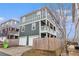 Charming two-story home with a two-car garage, a fenced yard, and a welcoming porch at 692 Rose Palm Ln, Atlanta, GA 30315