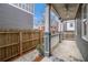Inviting covered porch featuring classic columns and a fan for comfortable outdoor living at 692 Rose Palm Ln, Atlanta, GA 30315