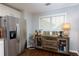 Kitchenette bar with rustic wooden cabinet and beverage storage at 327 Balaban Cir, Woodstock, GA 30188