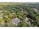 Stunning aerial view of the property showcasing the home's layout and surrounding landscape at 4395 Woodland Brook Se Dr, Atlanta, GA 30339