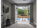 Balcony overlooking a beautiful backyard with mature trees, fencing, inground pool, and pergolas at 4395 Woodland Brook Se Dr, Atlanta, GA 30339