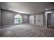 Large carpeted bedroom with big windows, recessed lighting, and multiple doors at 4395 Woodland Brook Se Dr, Atlanta, GA 30339