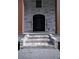 Elegant entrance with brick steps at 4395 Woodland Brook Se Dr, Atlanta, GA 30339