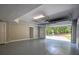 Spacious garage featuring an automatic door and room for vehicle parking and additional storage at 4395 Woodland Brook Se Dr, Atlanta, GA 30339