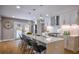 Spacious kitchen boasts a large island, stainless steel appliances, and modern pendant lighting at 4395 Woodland Brook Se Dr, Atlanta, GA 30339