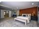 Nicely decorated bedroom with seating, neutral colors, and ensuite bathroom at 4395 Woodland Brook Se Dr, Atlanta, GA 30339