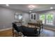 Bright home office with hardwood floors, stylish decor, and a large window at 4395 Woodland Brook Se Dr, Atlanta, GA 30339