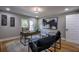 Well-lit office featuring modern decor, sleek furnishings, and large window at 4395 Woodland Brook Se Dr, Atlanta, GA 30339
