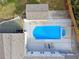 Direct aerial view of the pool area with lounge chairs for relaxing poolside at 4395 Woodland Brook Se Dr, Atlanta, GA 30339